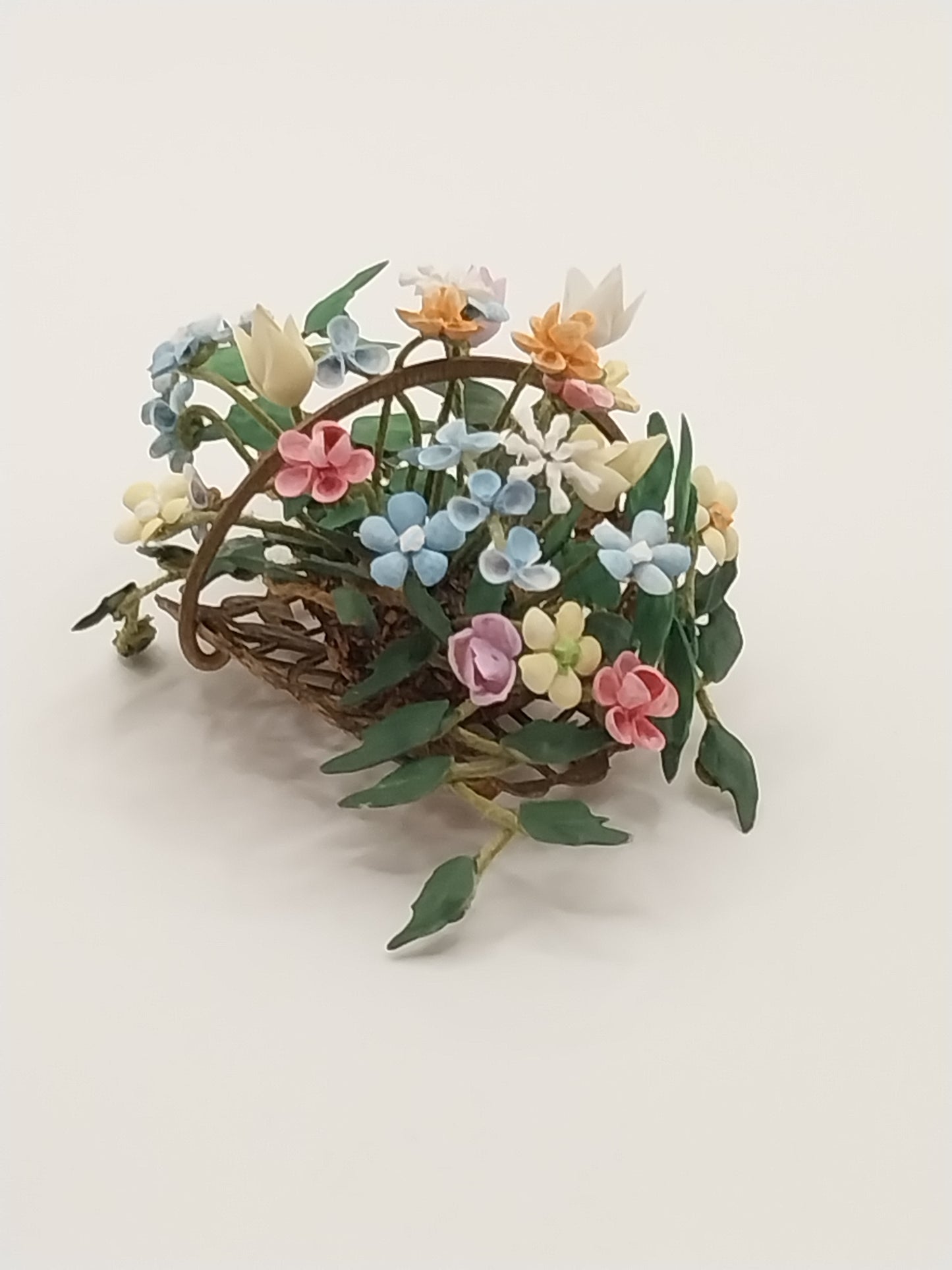 Floral Arrangement In Metal Basket