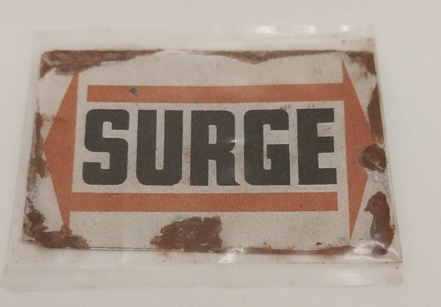 Rusty Surge Sign