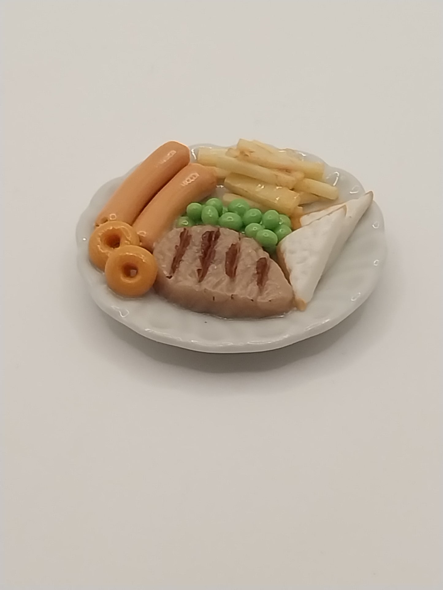 Steak With Hot Dogs & French Fries On Plate