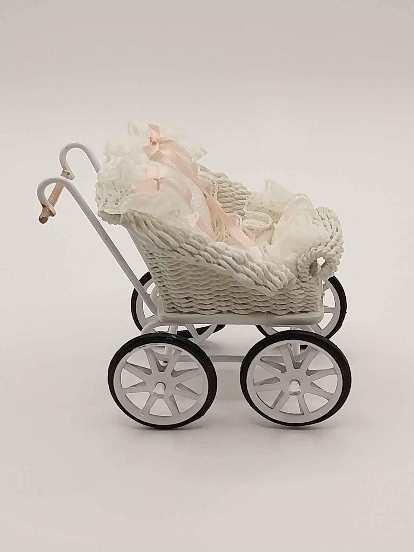 White Wicker Pram, Silk With Pink Ribbon
