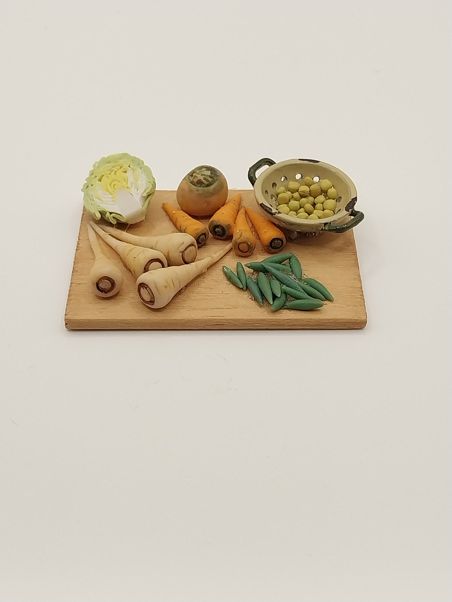 Fresh Veggies With Peas In Collander, Board