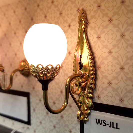 CBB541, Brass Sconce with Tall Ornate Back Plate
