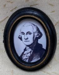 Print of George Washington in Black Oval Frame