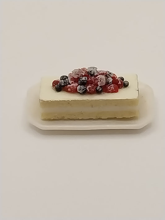 Cream Cake With Berries On Plate