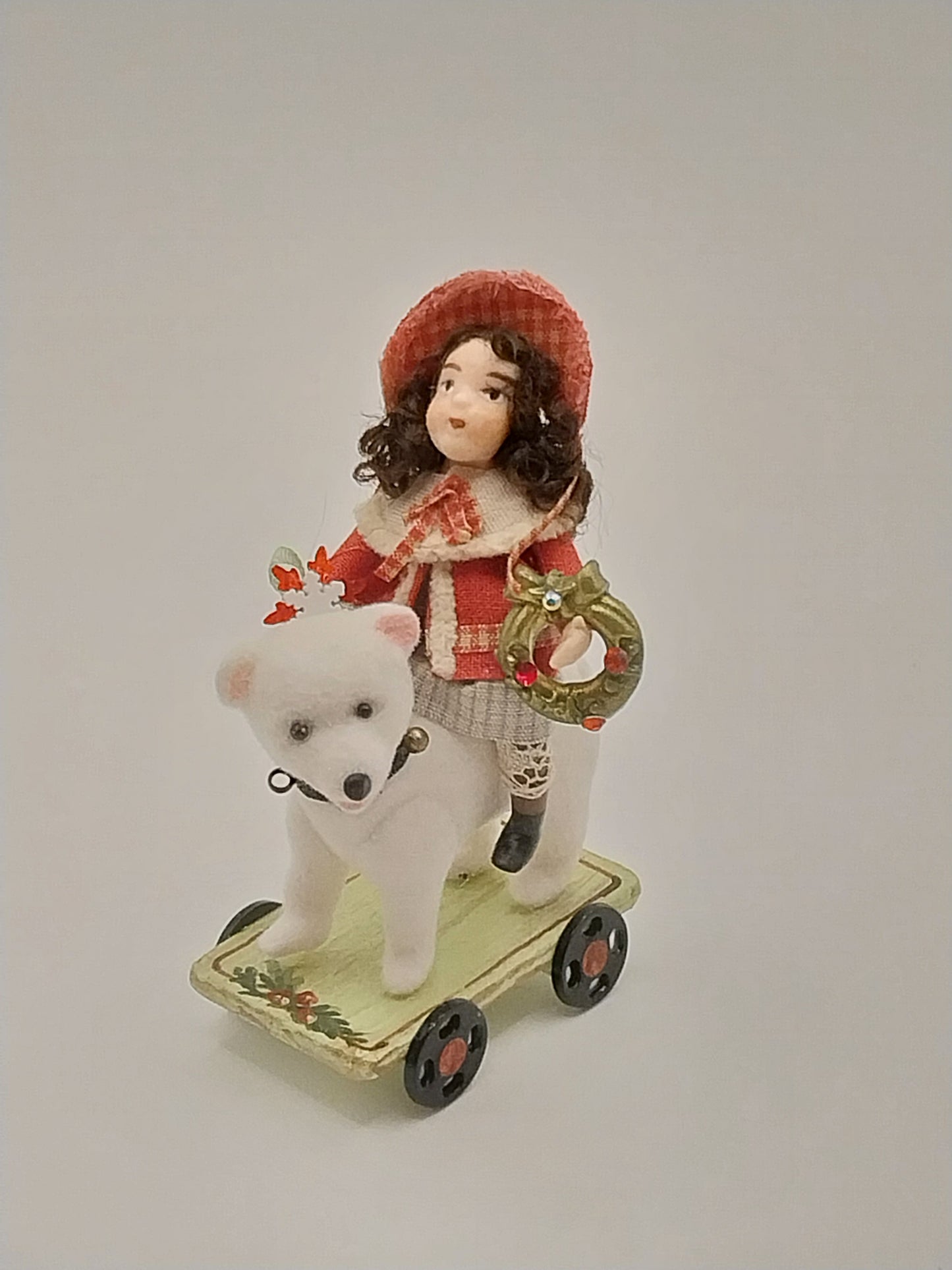 Christmas Doll On Bear With Cart