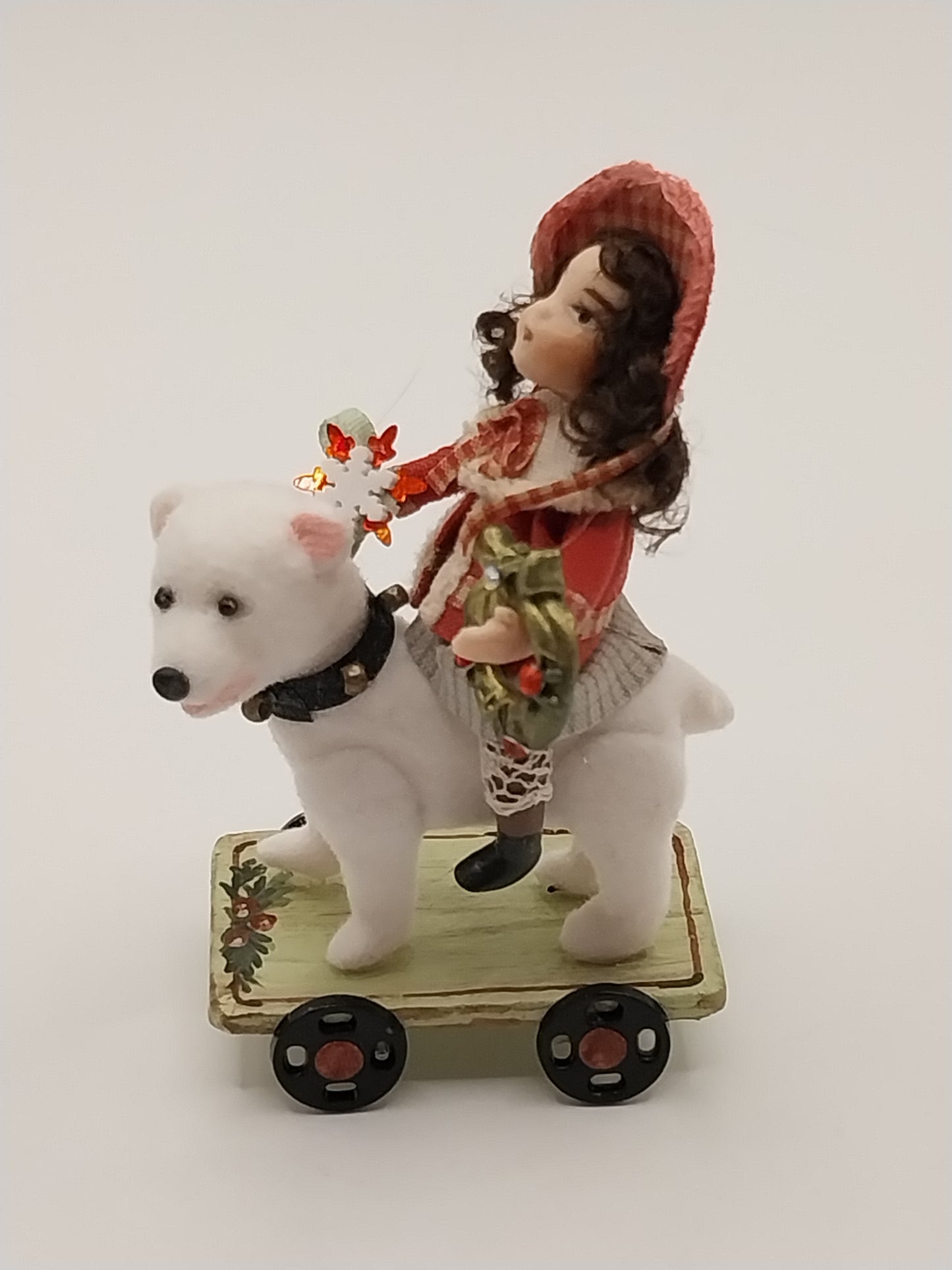 Christmas Doll On Bear With Cart