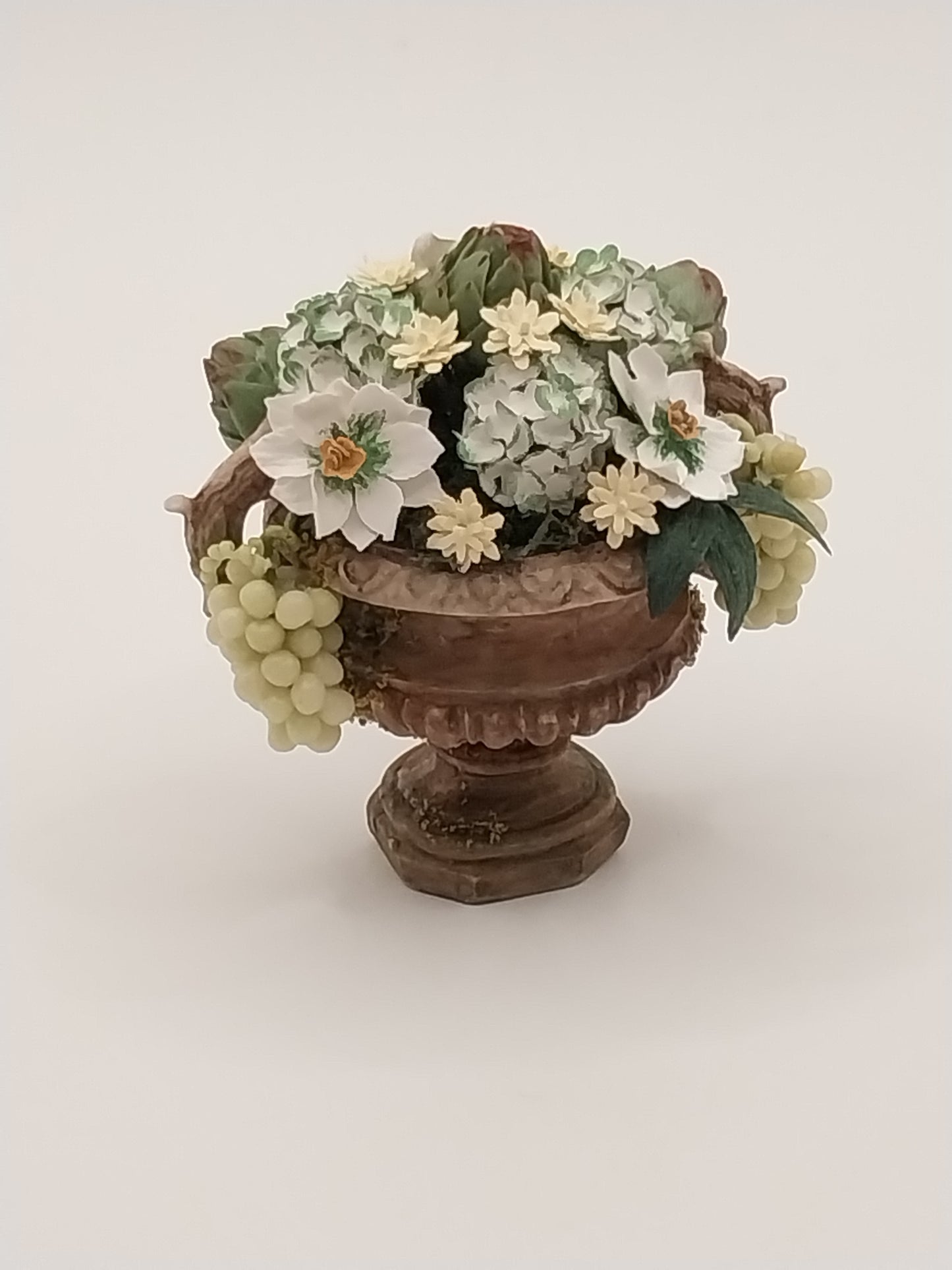 Flower Arrangement In Urn, Poinsettia, Hydrangea, & Artichokes