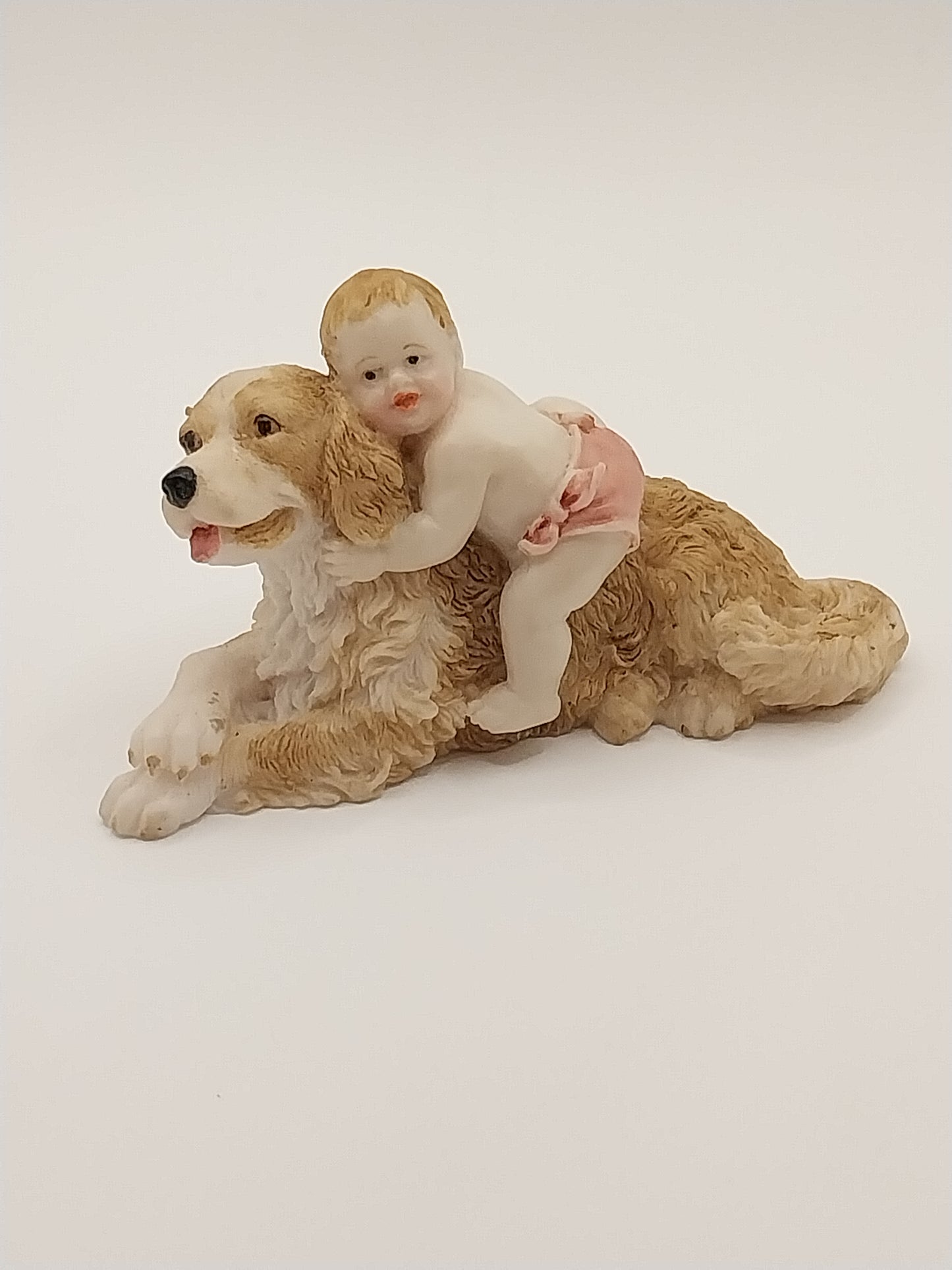 Dog Laying With Baby On Top