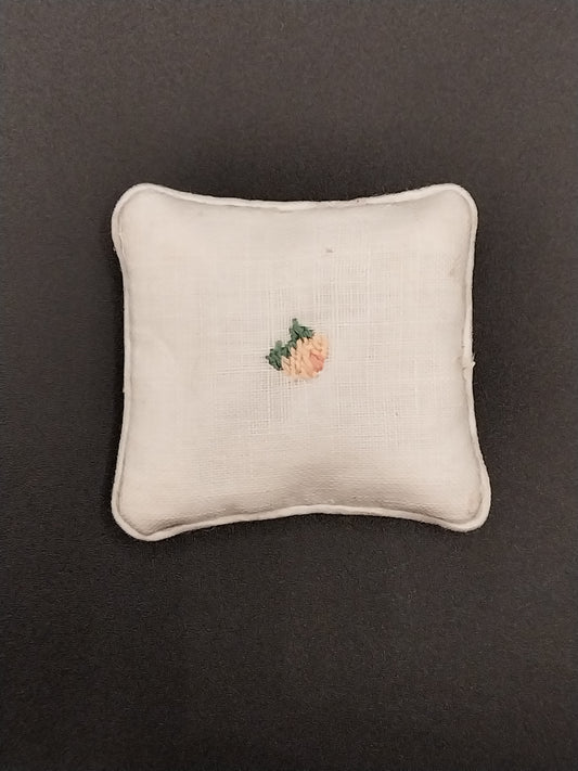 White Pillow With Needlework Rose