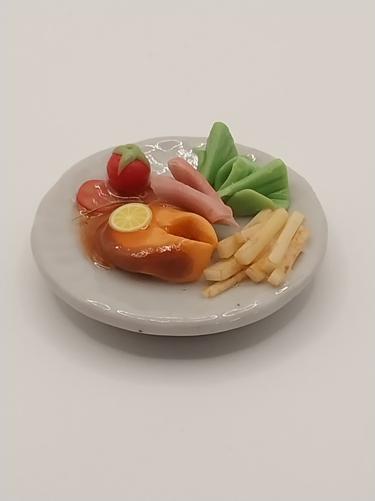 Salmon With French Fries On Plate