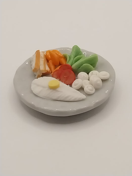 Cod Fish With Vegetables On Plate