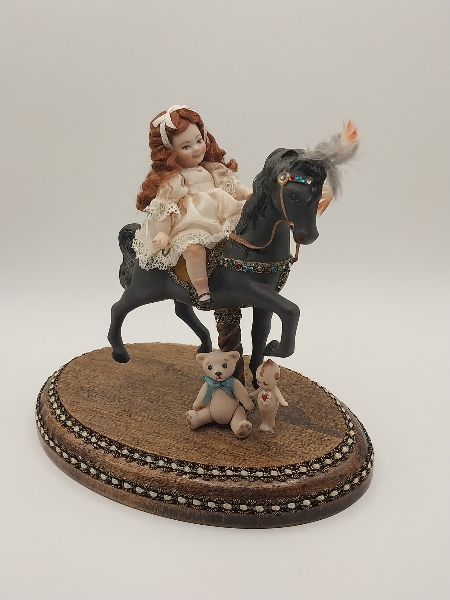 Little Girl on Carousel Horse