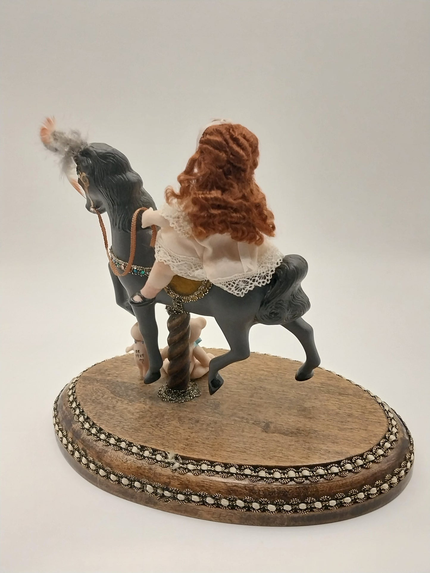 Little Girl on Carousel Horse
