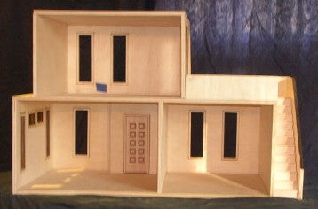 The Adobe Assembled Dollhouses