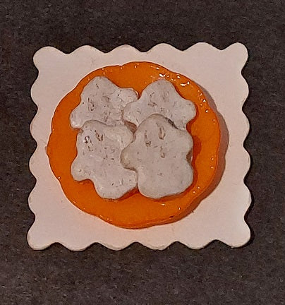 Ghost Cookies On Baking Sheet