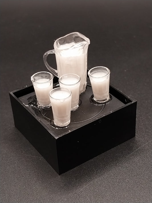 Pitcher Of Milk With 4 Glasses