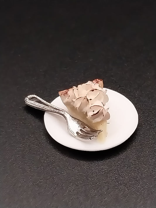 Slice of Lemon Meringue Pie with Fork