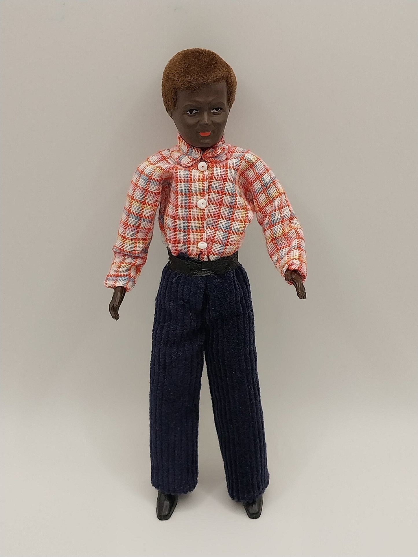 African American Man with Plaid Shirt & Corduroy Slacks