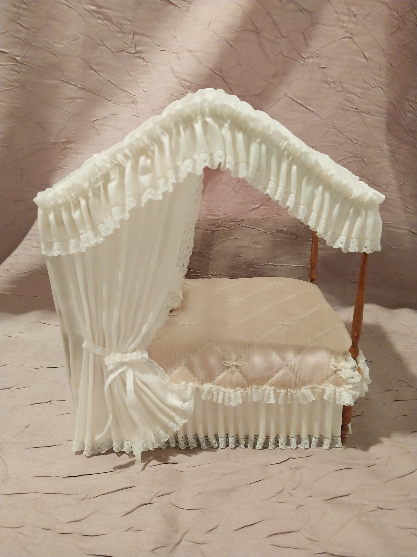 Canopy Bed with Pink Quilted Fabric