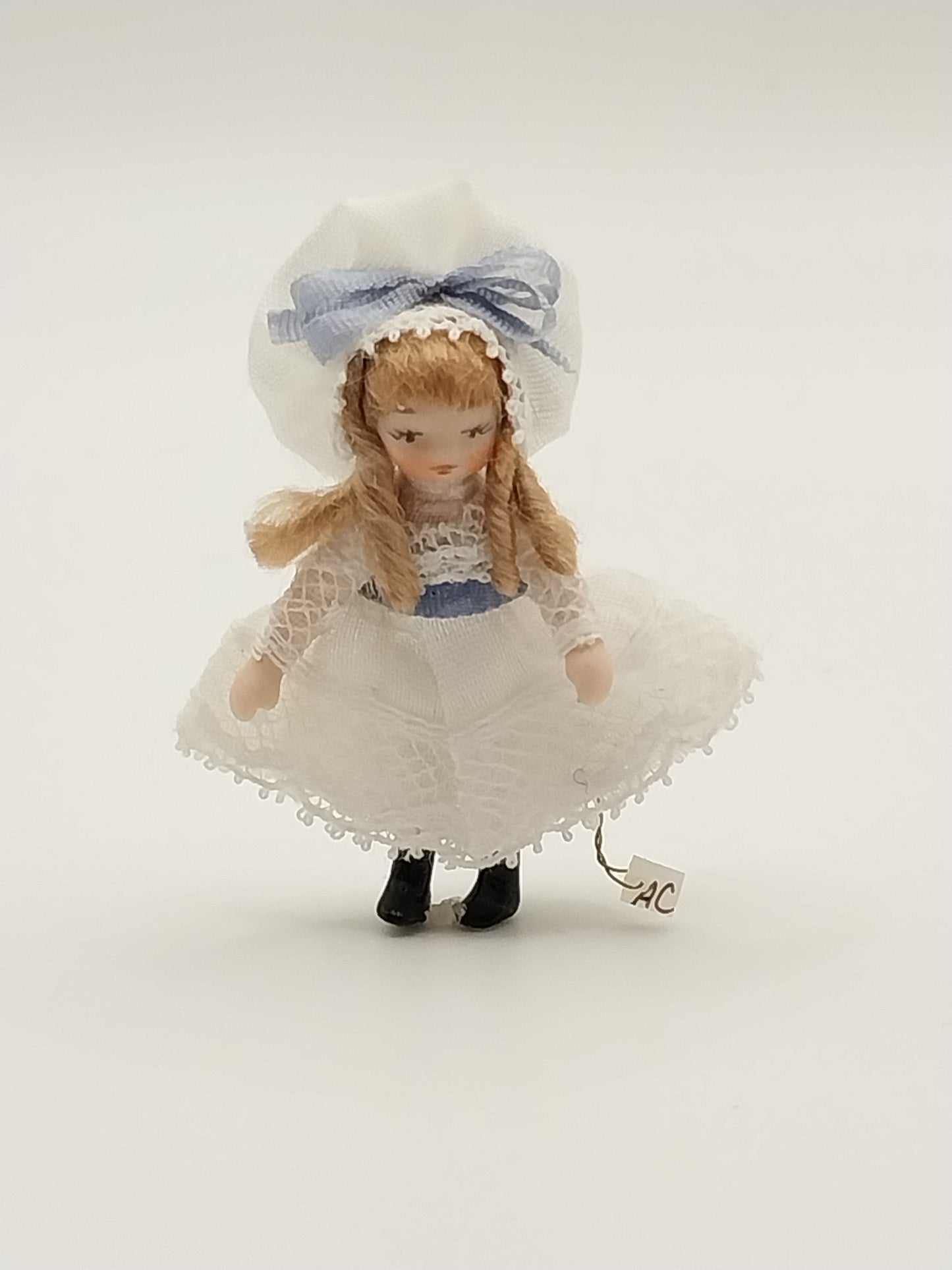 Porcelain Baby Doll, White Dress with Blue Trim