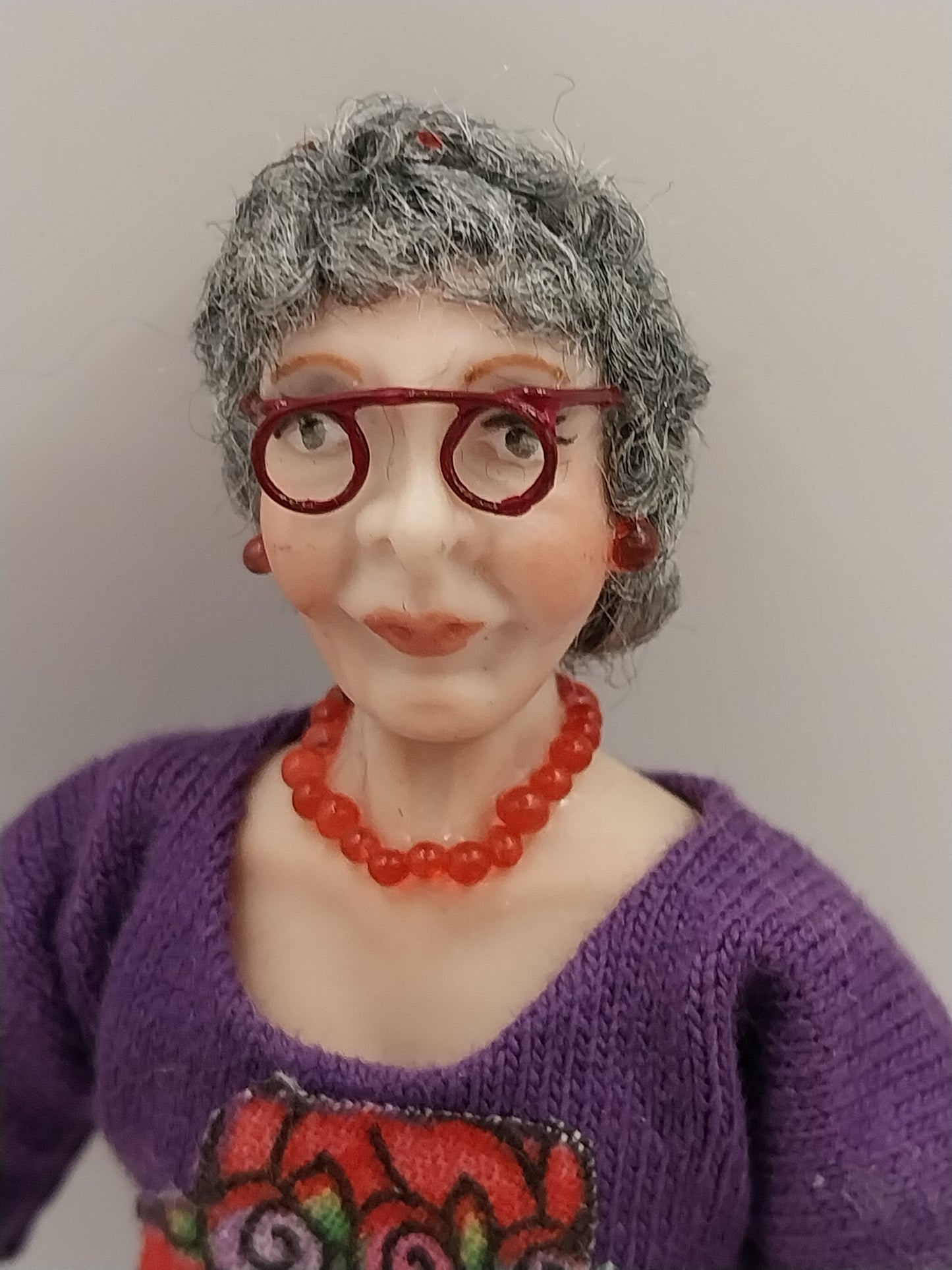 Porcelain Elderly Lady Doll, Jeans & Purple Shirt