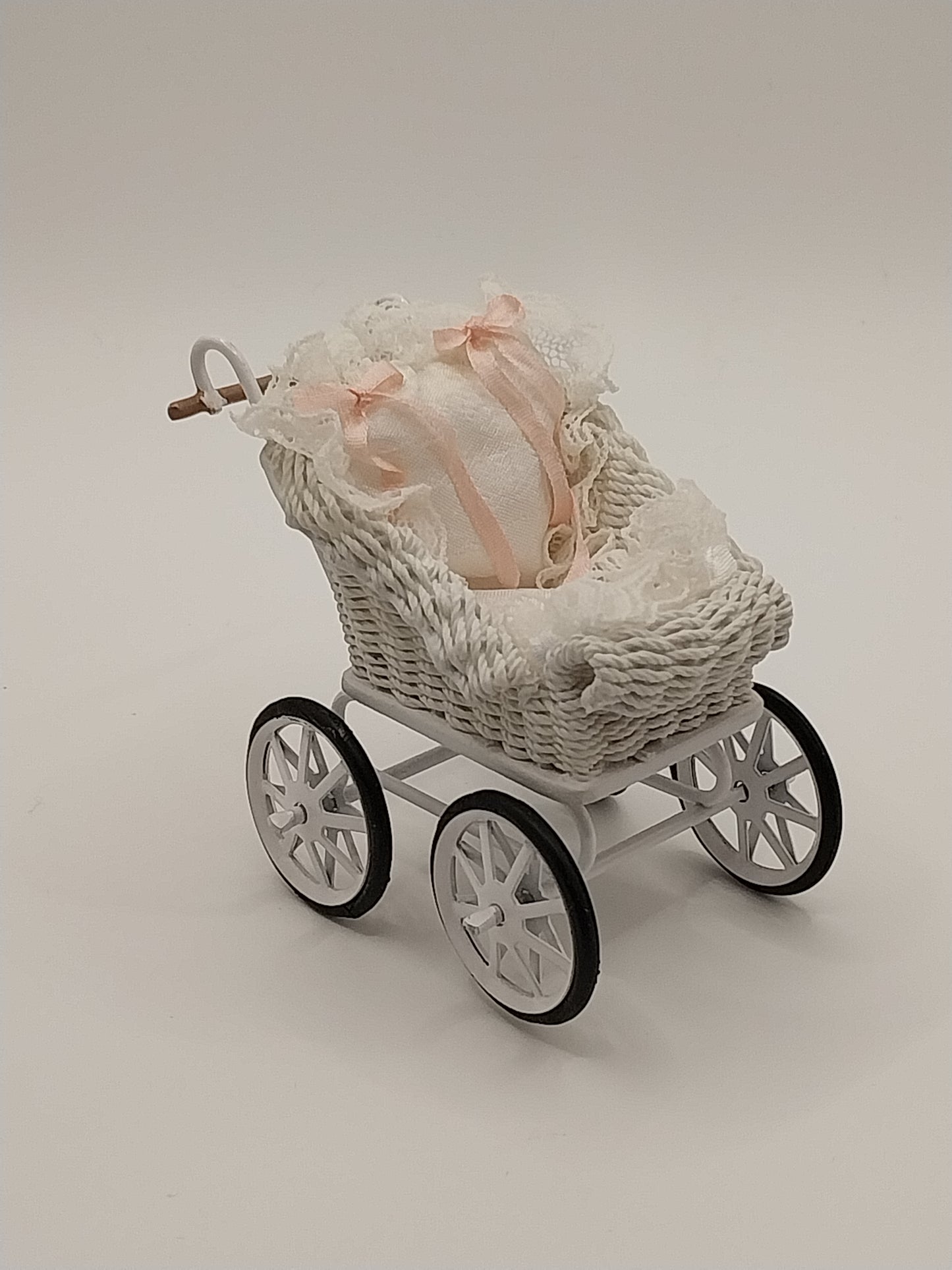 White Wicker Pram, Silk With Pink Ribbon