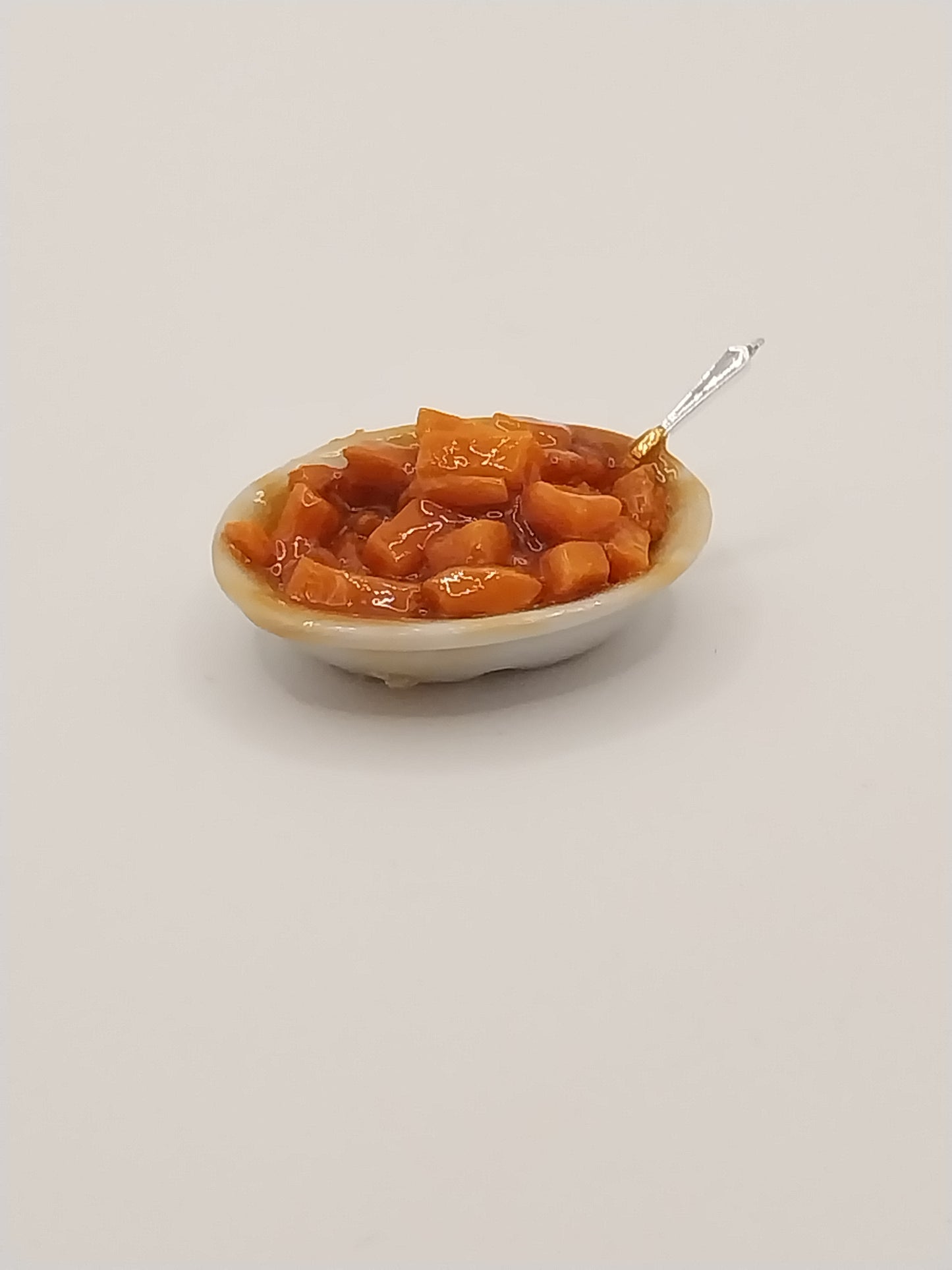 Sweet Potatoes In Bowl with Spoon