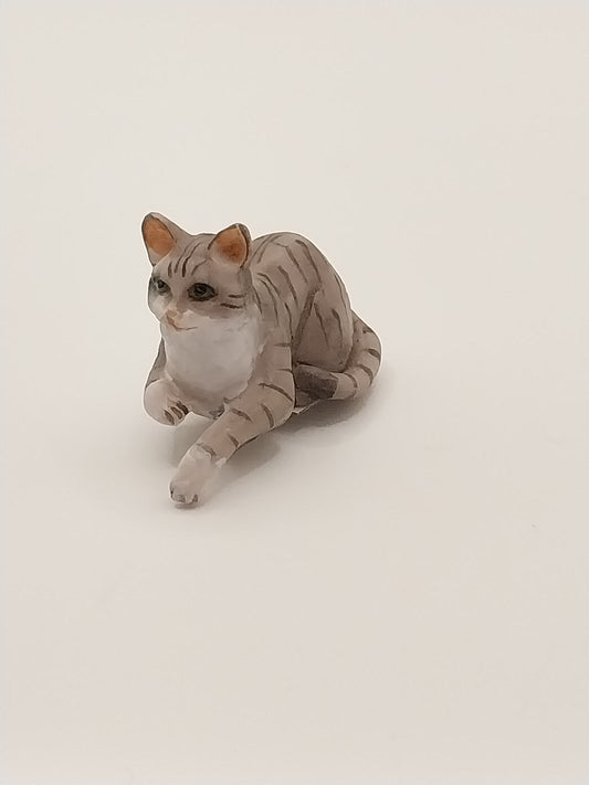 Laying Cat with Paw Hanging, Grey Tabby