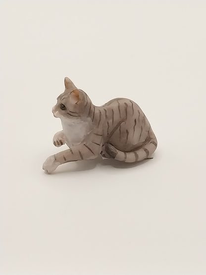 Laying Cat with Paw Hanging, Grey Tabby