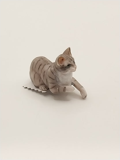 Laying Cat with Paw Hanging, Grey Tabby