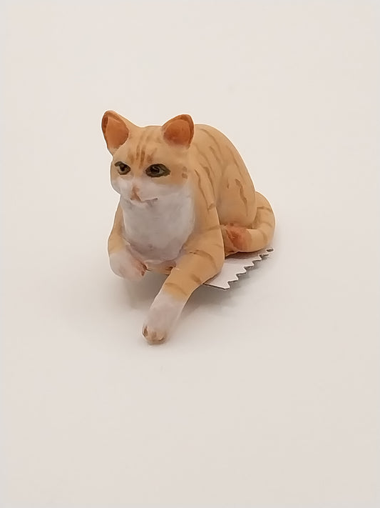 Laying Cat with Paw Hanging, Orange Tabby