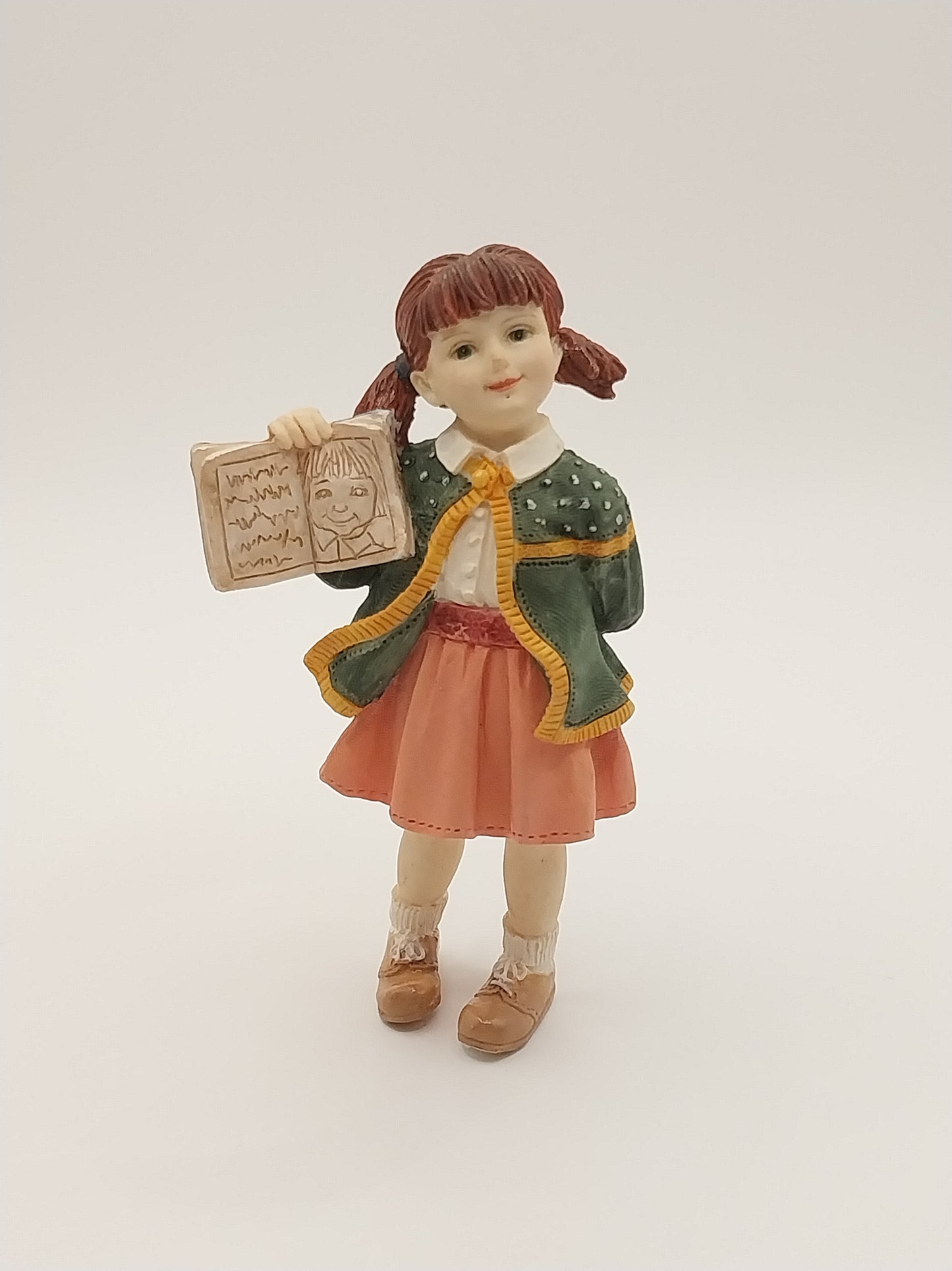 Girl Doll With Book, Resin