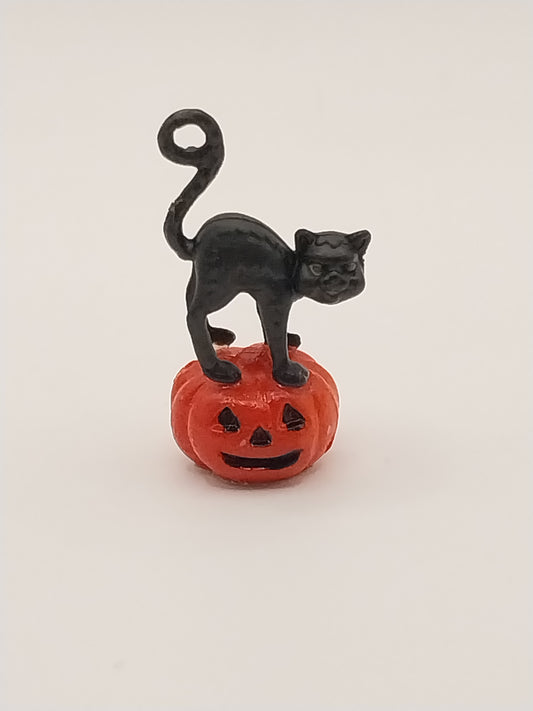 Black Cat On Pumpkin