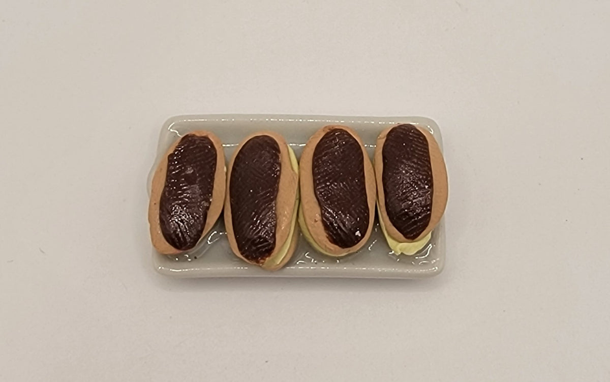Eclairs Filled on a Plate