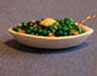 Peas & Carrots In Bowl with Spoon