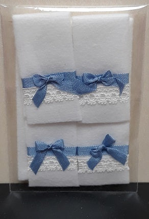 White Towels with Blue Bows