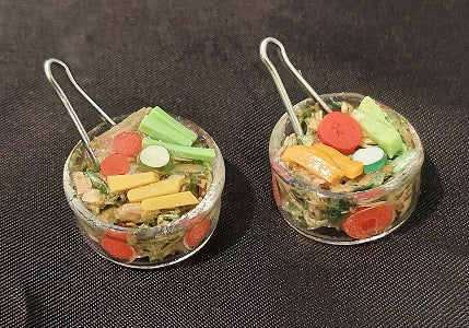 Salad in Clear Bowl with Tongs