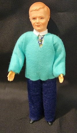 Modern man with Turquoise Sweater & Navy Slacks