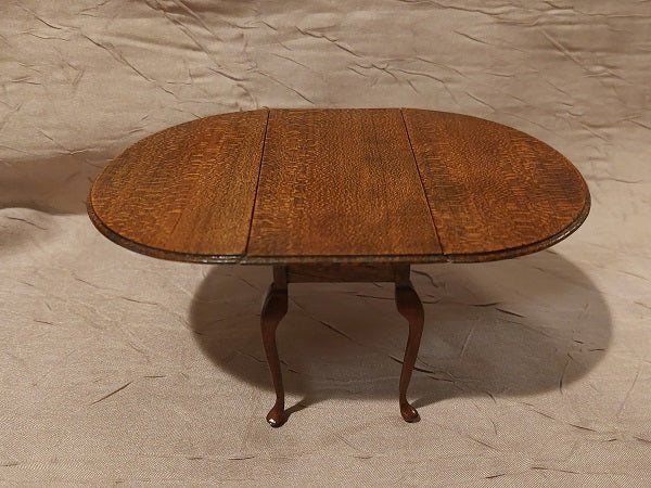 Oval Dining Table with Folding Leaves