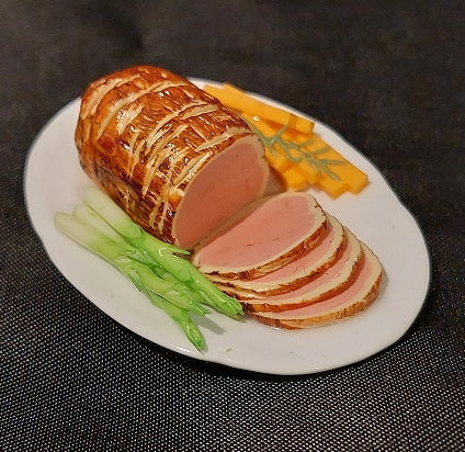 Roast, Sliced on Metal Platter with Garnish