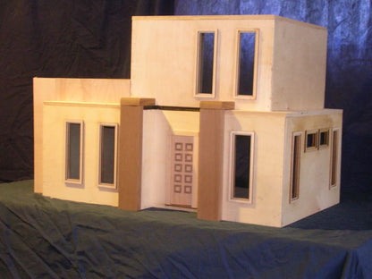 The Adobe Assembled Dollhouses