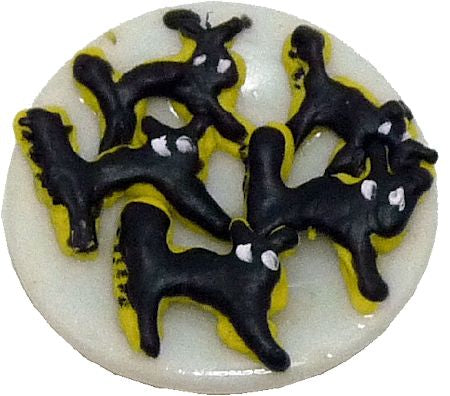 Black Cat Cookies on a Plate